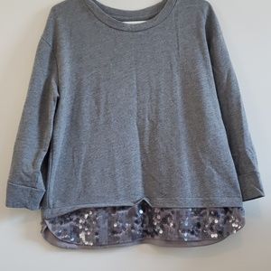Long sleeve shirt with sequin bottom